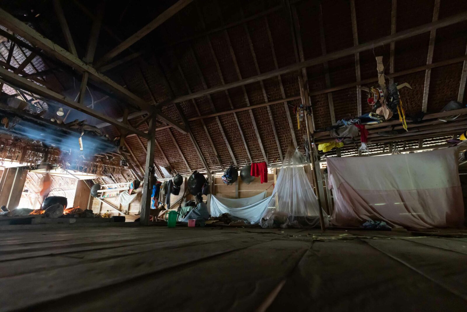Sleeping arrangement in a traditionla uma clan house on Siberut Island