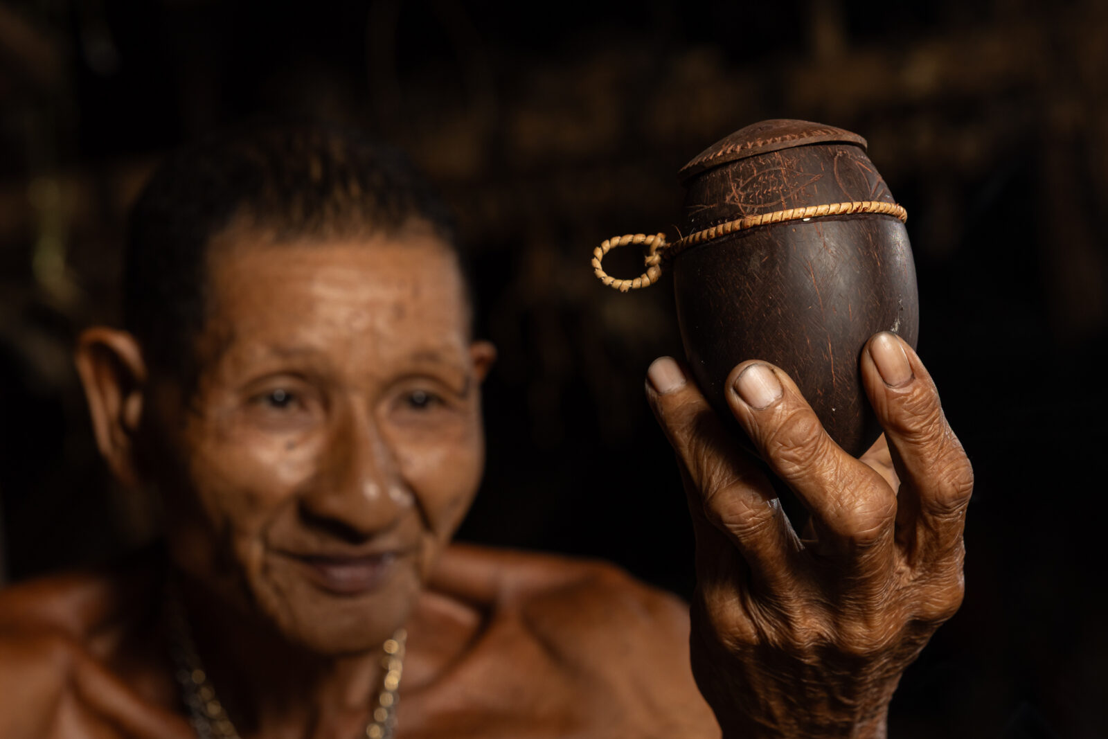 Traditional Mentawai tobacco container made from coconut shell