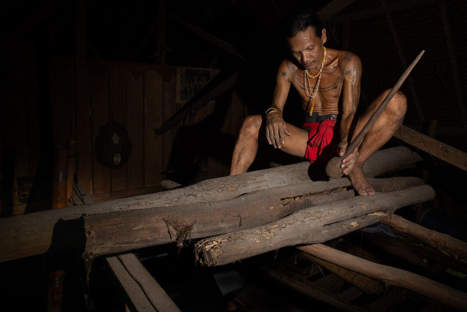 Mentawai shaman playing tuddukat communication tool