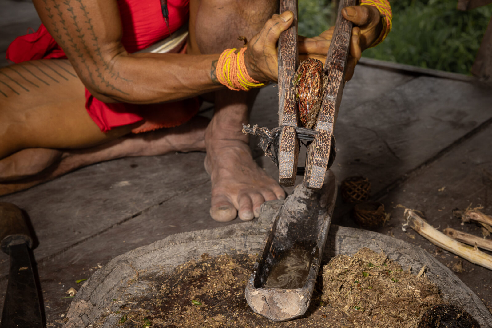 Mentawai man making poison for hunting on Siberut Island