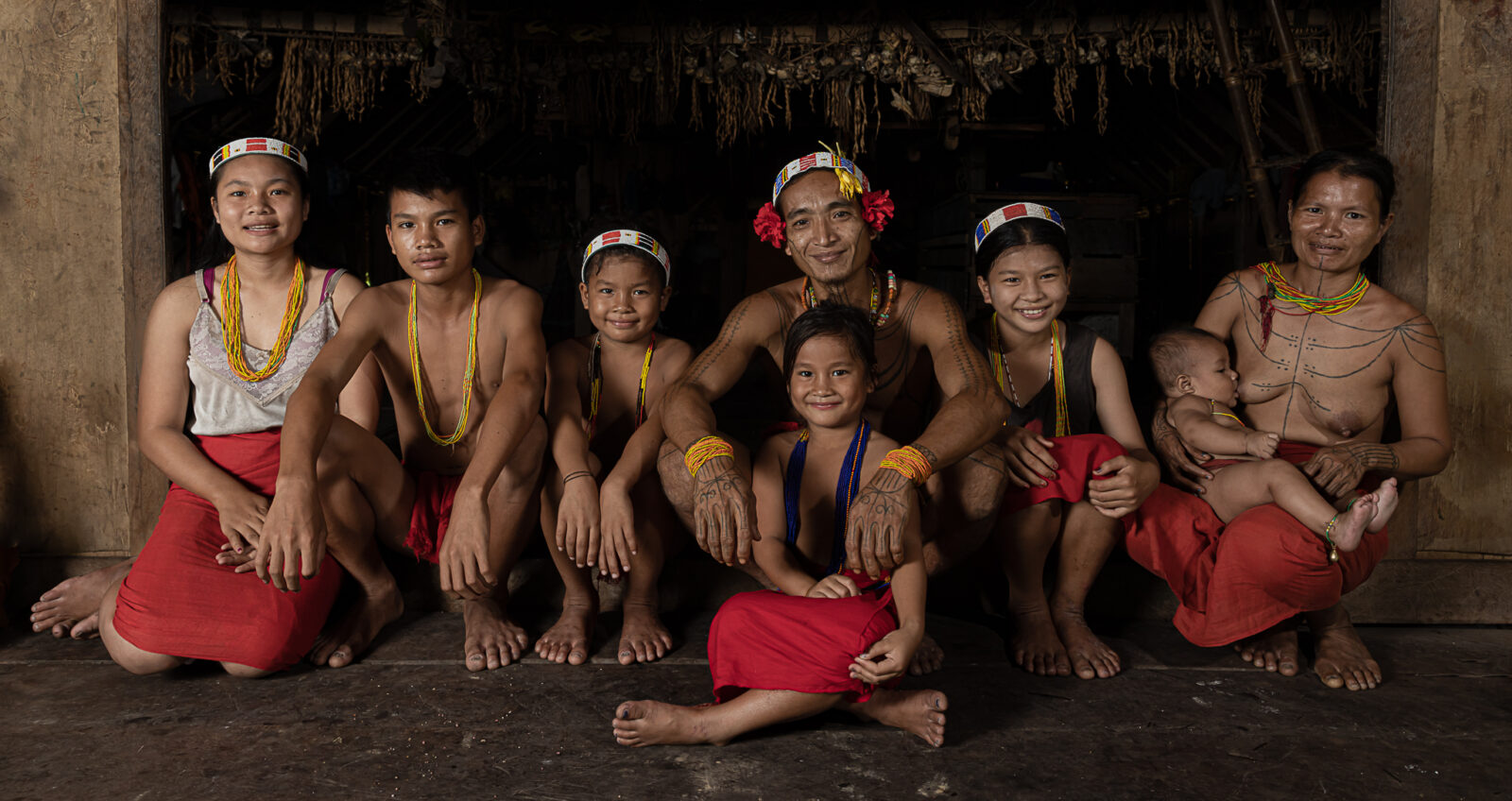 Mentawai family with children in traditional attire