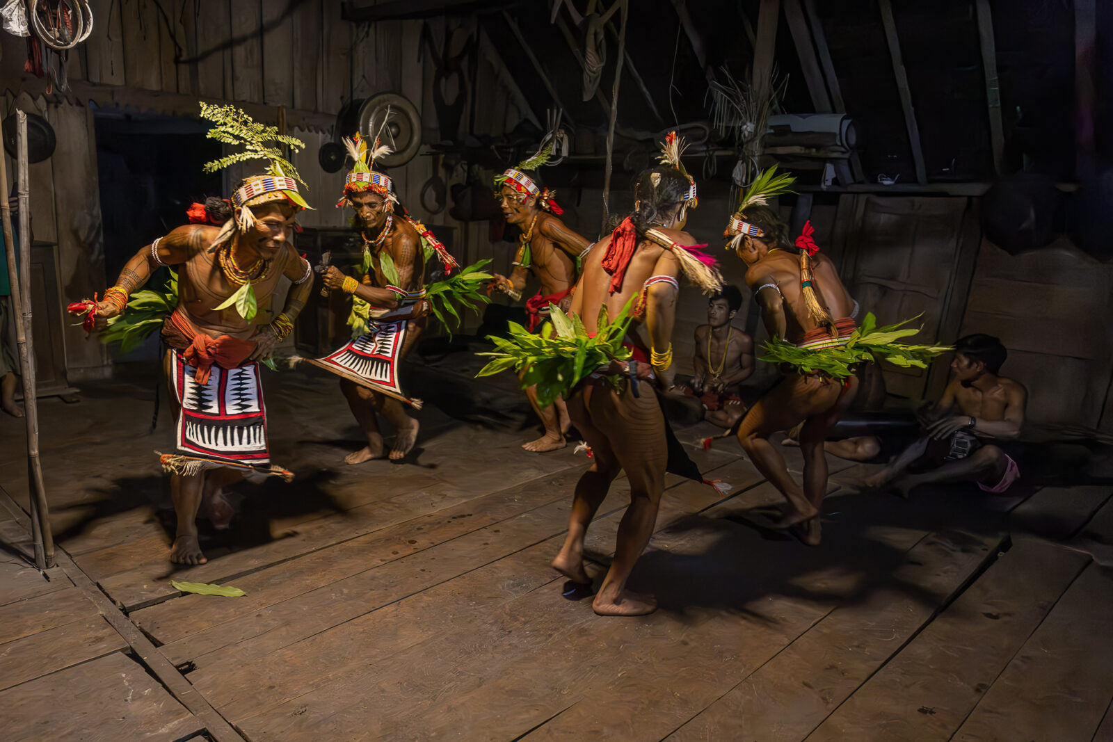 Mentawai shamans on Siberut Island dancing lajo during ceremony