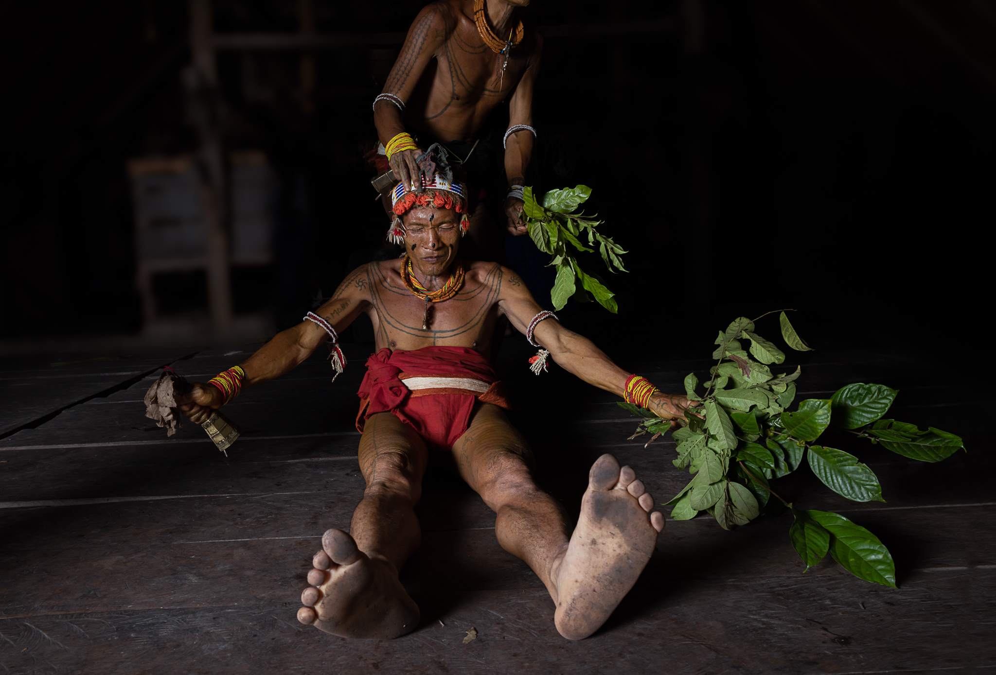 Mentawai shaman in trance during pasibitbit house cleansing ritual