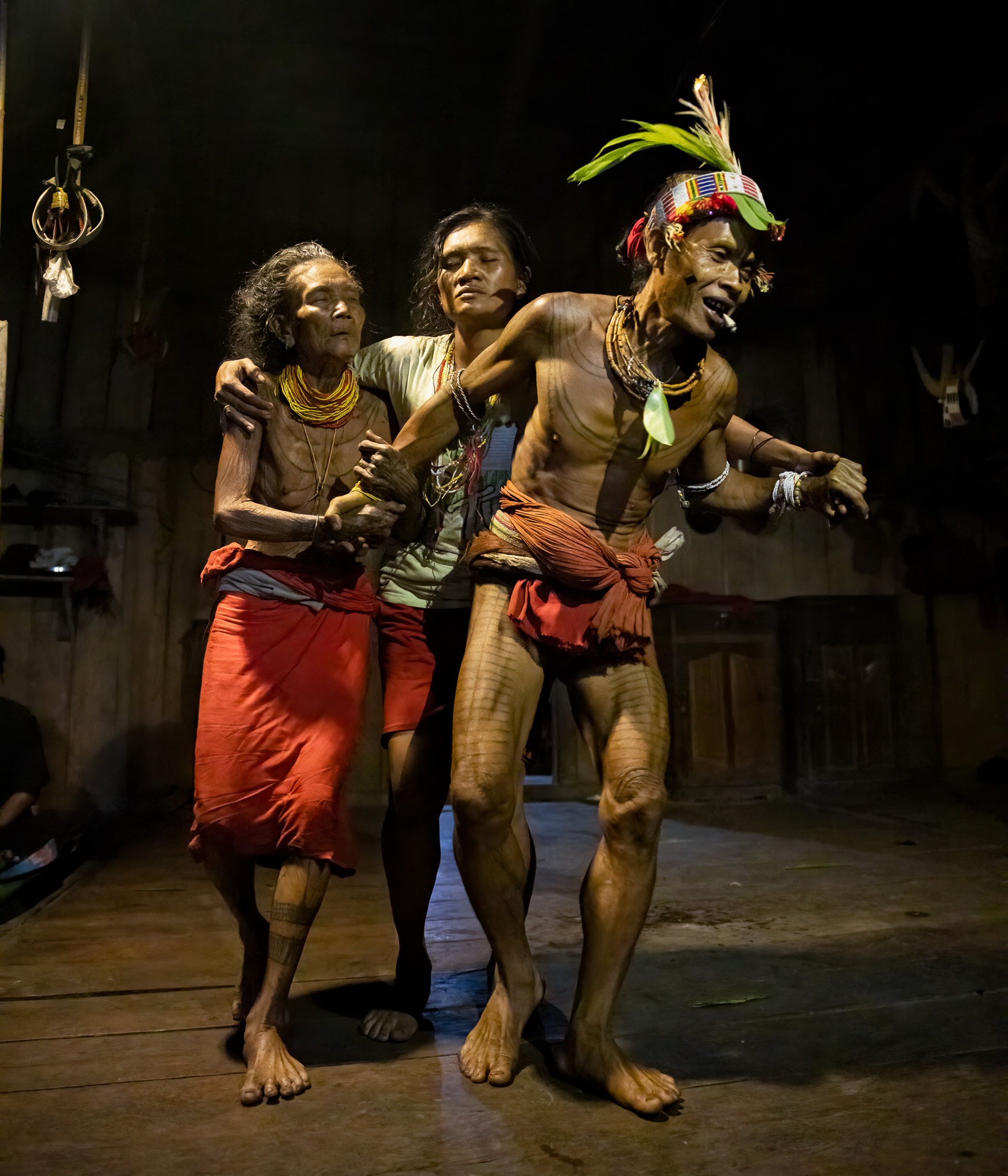 Mentawai shaman and women in trance during ritual ceremony