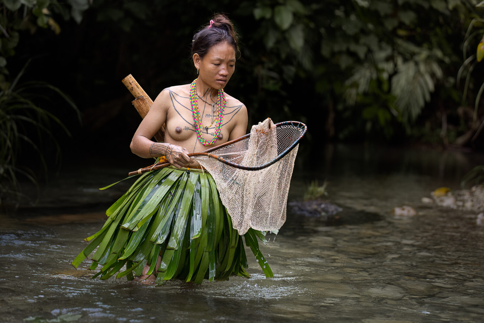Mentawai woman fishing on Siberut
