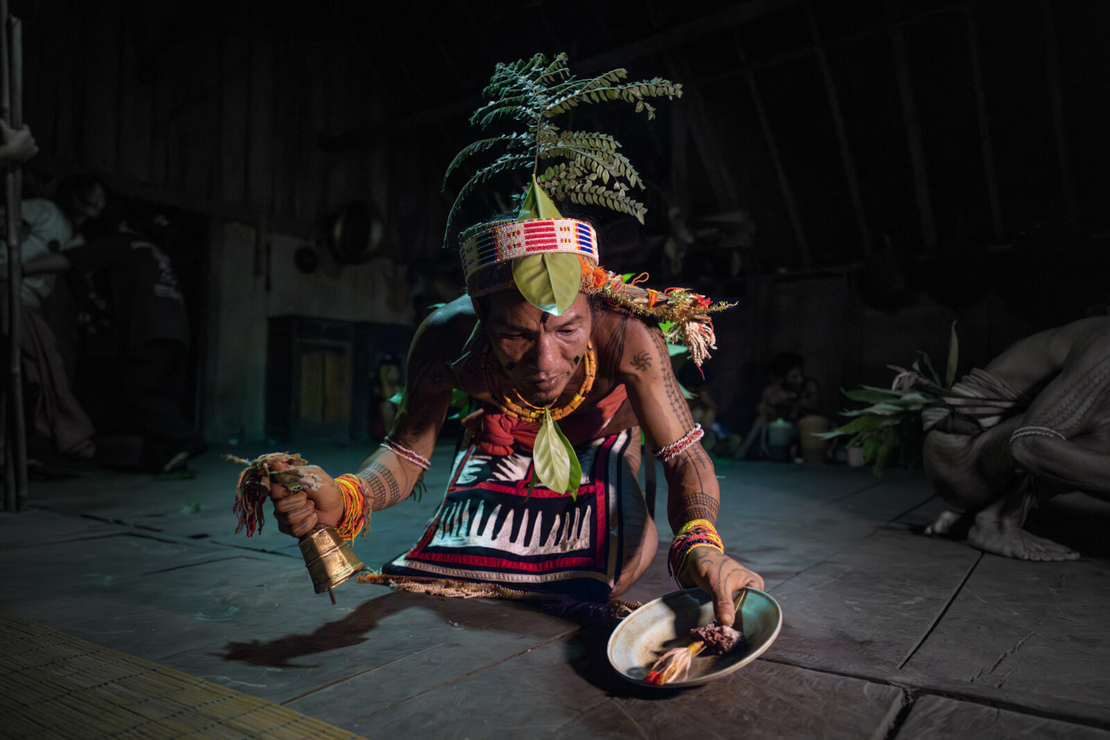 Mentawai shaman catching souls during lajo simagere ritual