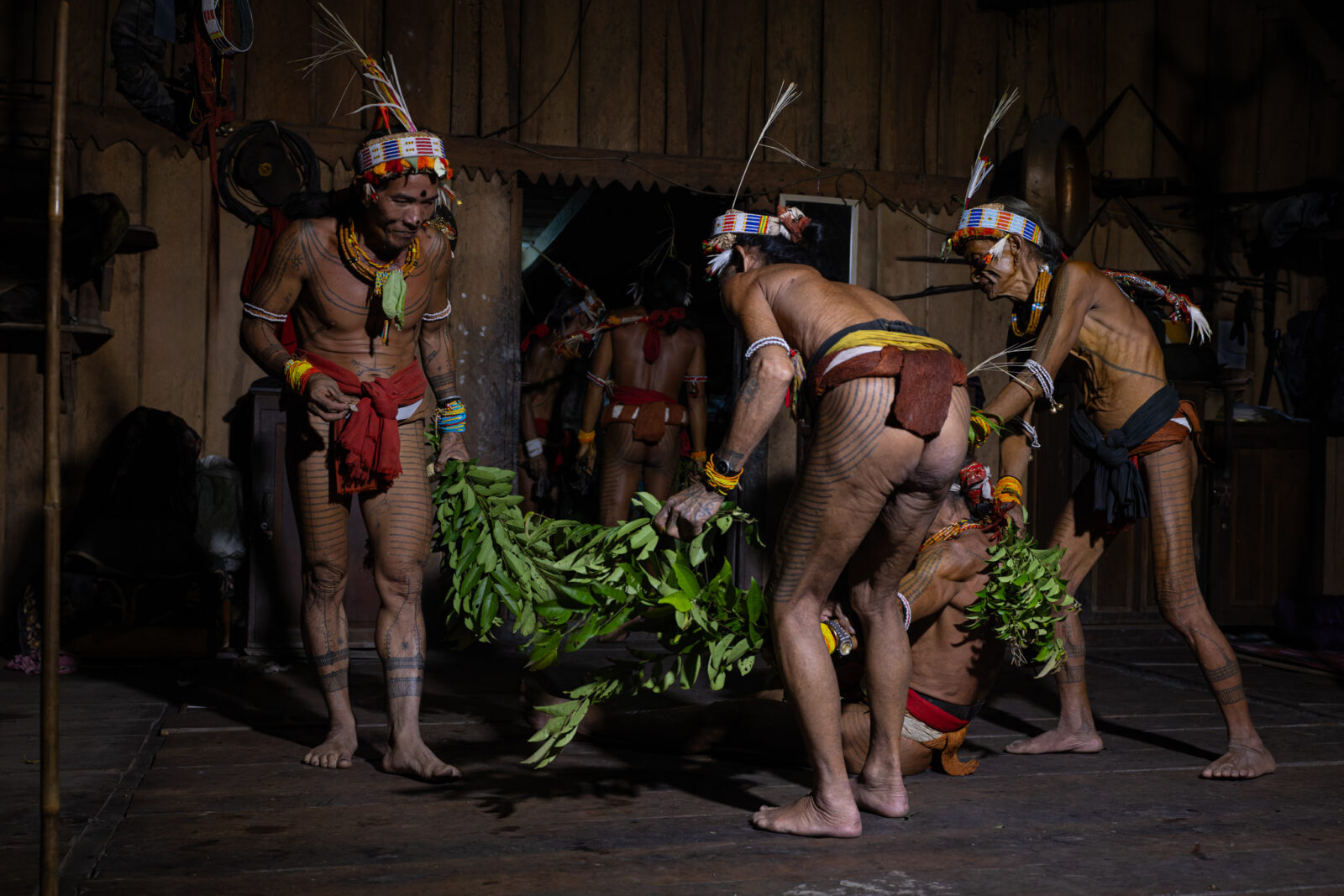 Mentawai shaman in trance during pasibitbit uma cleansing ritual